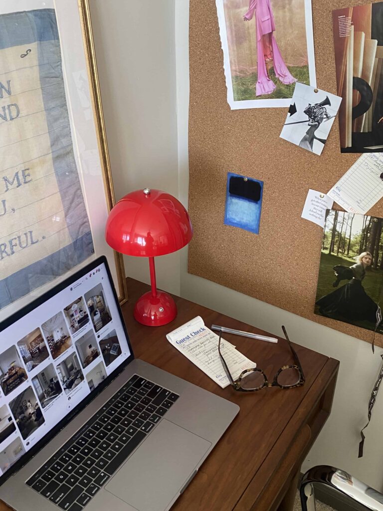 laptop on desk with lamp