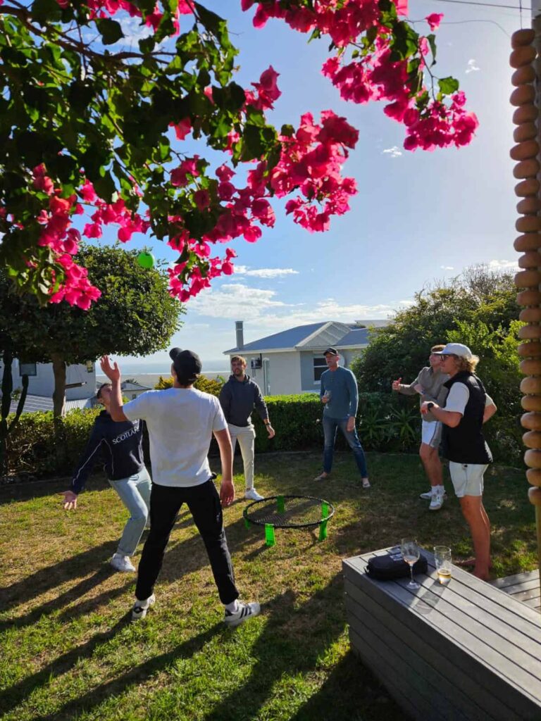 group of people playing with ball on grass