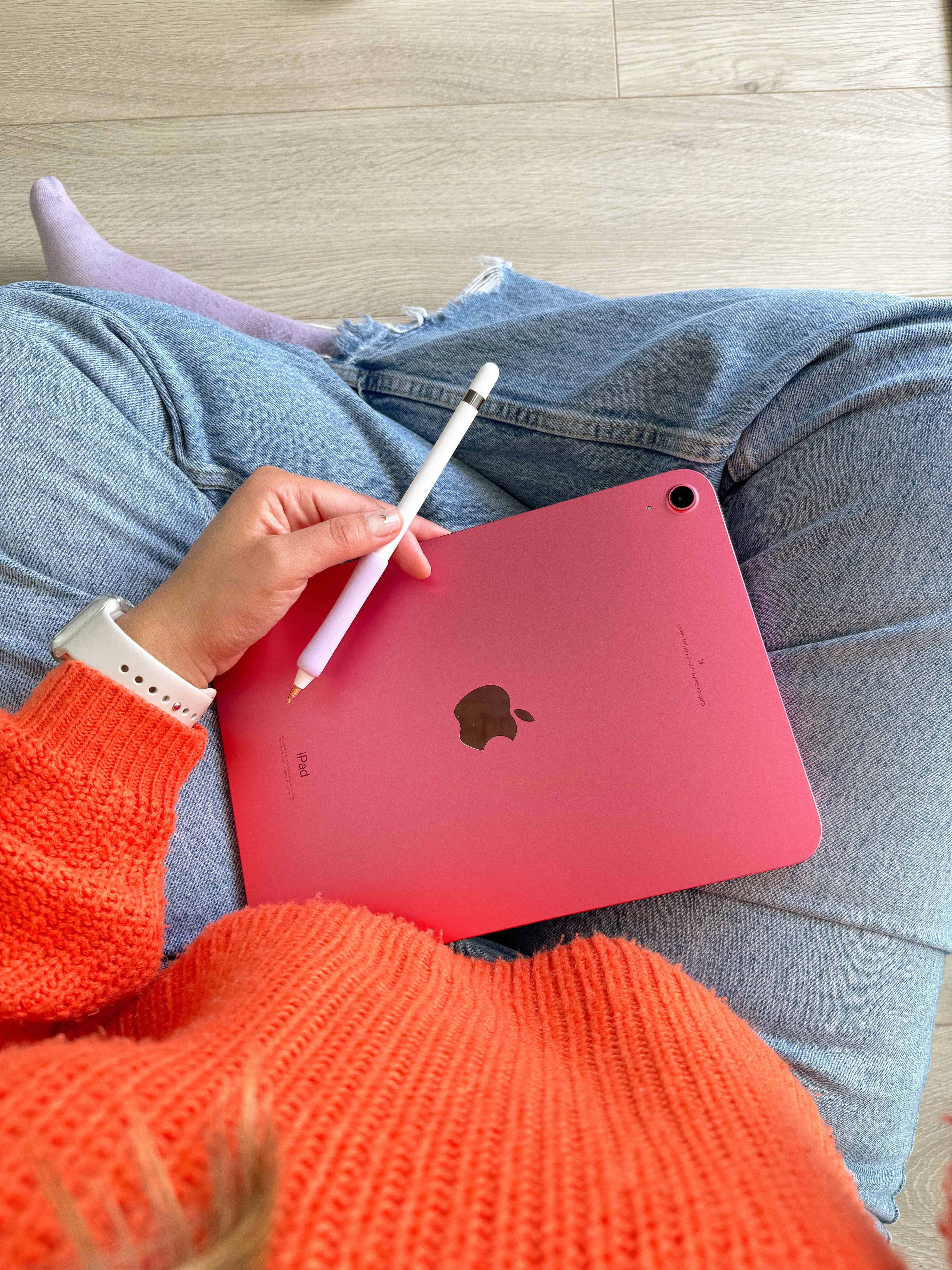 girl sitting with ipad in her lap