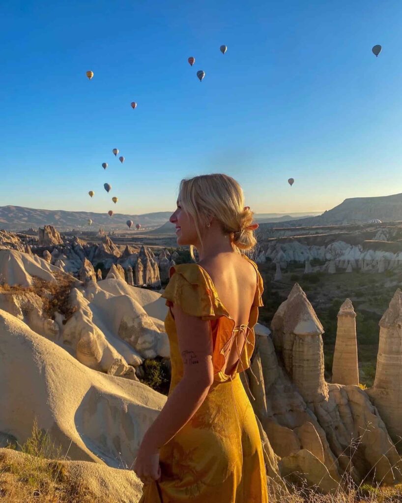 woman standing in front of desert