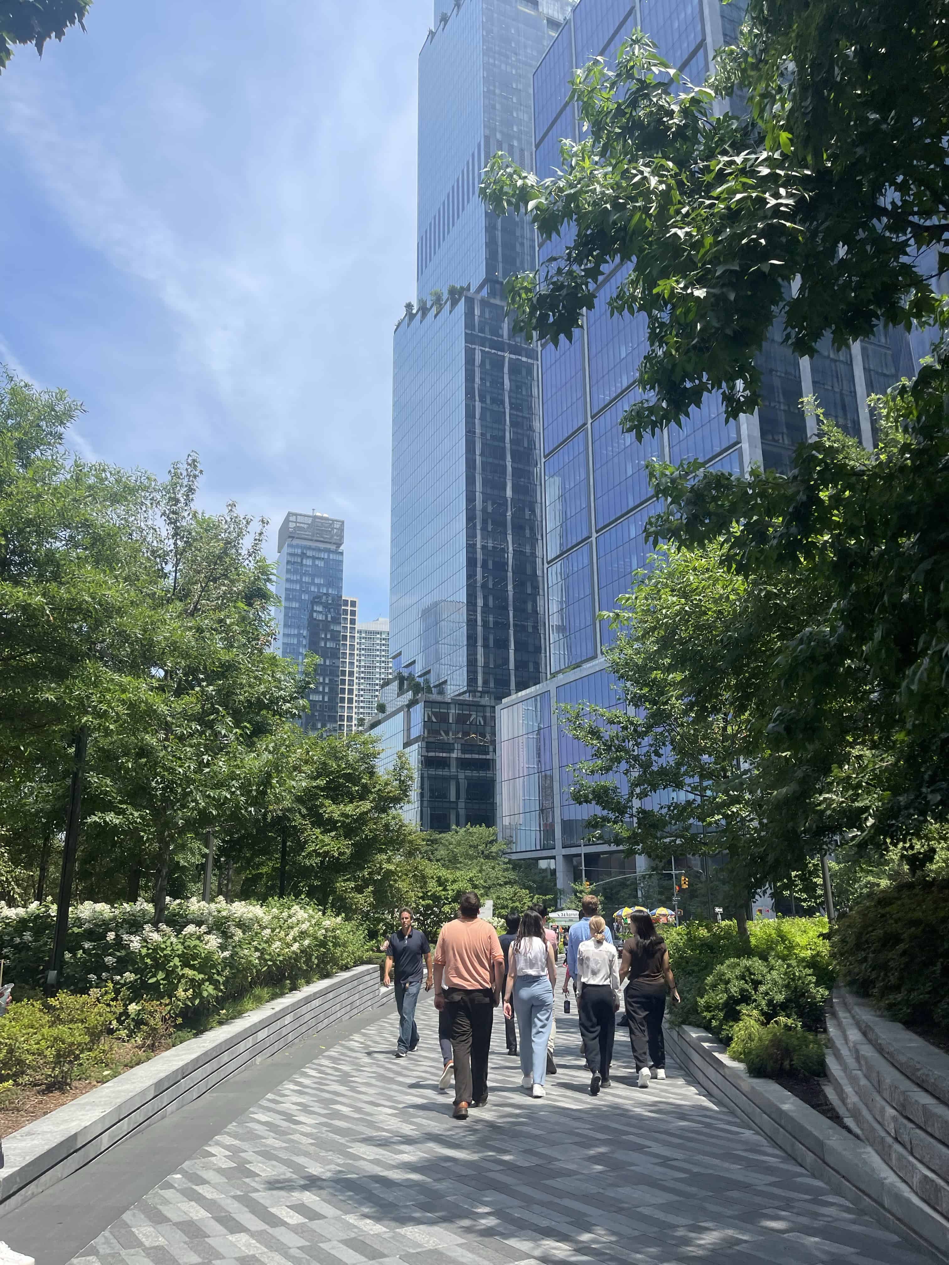 People walking through park