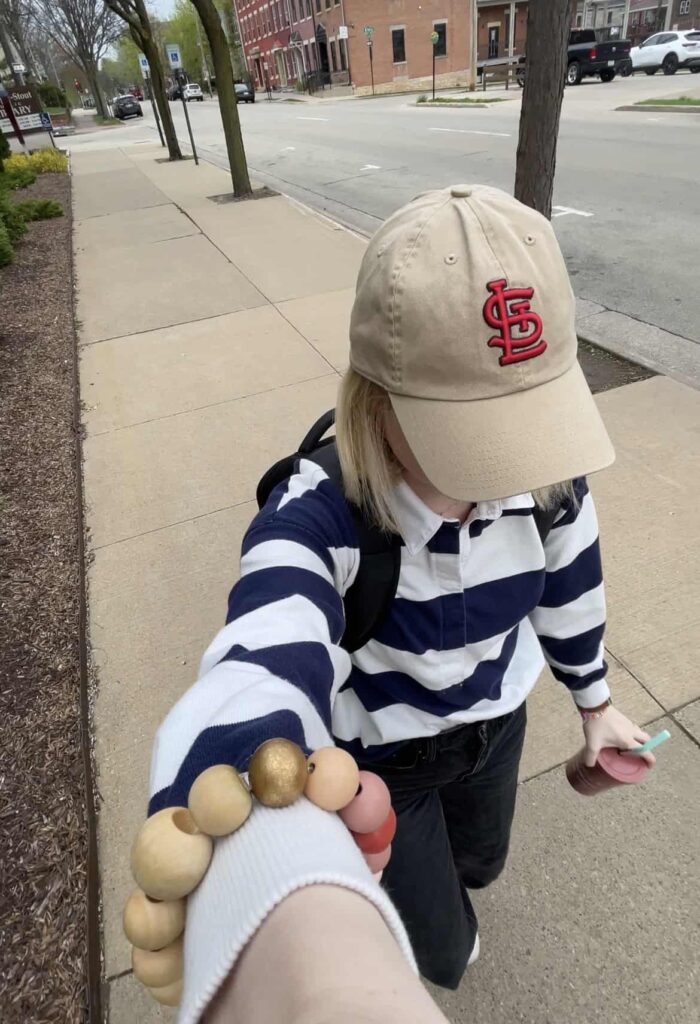 Girl wearing backpack walking